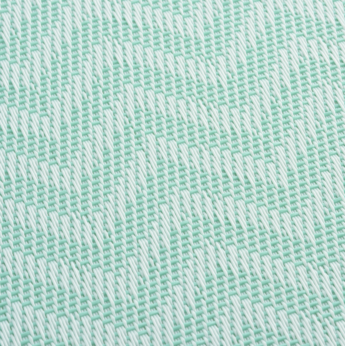 Gewebtes Tischset aus mintfarbenem Kunststoff mit rechteckiger Form und strukturierter Wellen-Weboptik