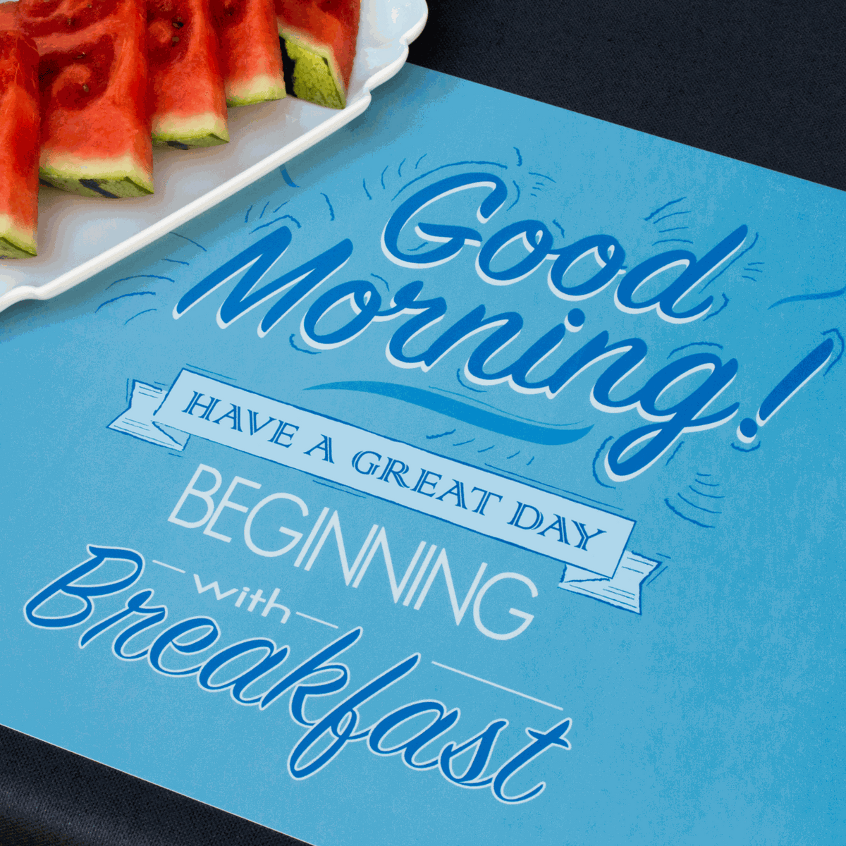 Tischset Food aus blauem Kunststoff mit weißem „Good Morning“-Schriftzug und Frühstücksmotiv, rechteckig