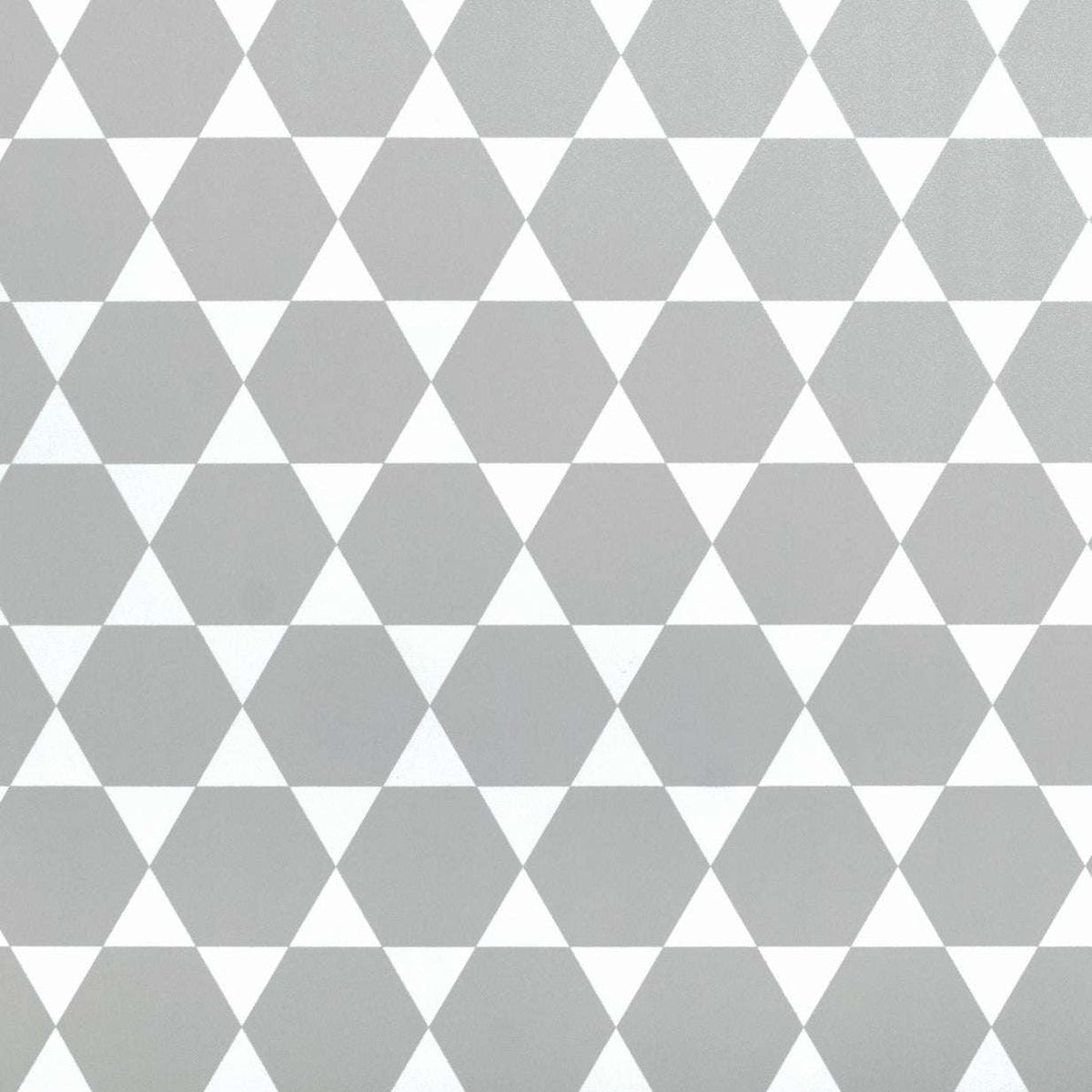 Tischset Geometrie in Grau und Weiß mit markantem Muster aus ineinandergreifenden Sechsecken und Dreiecken
