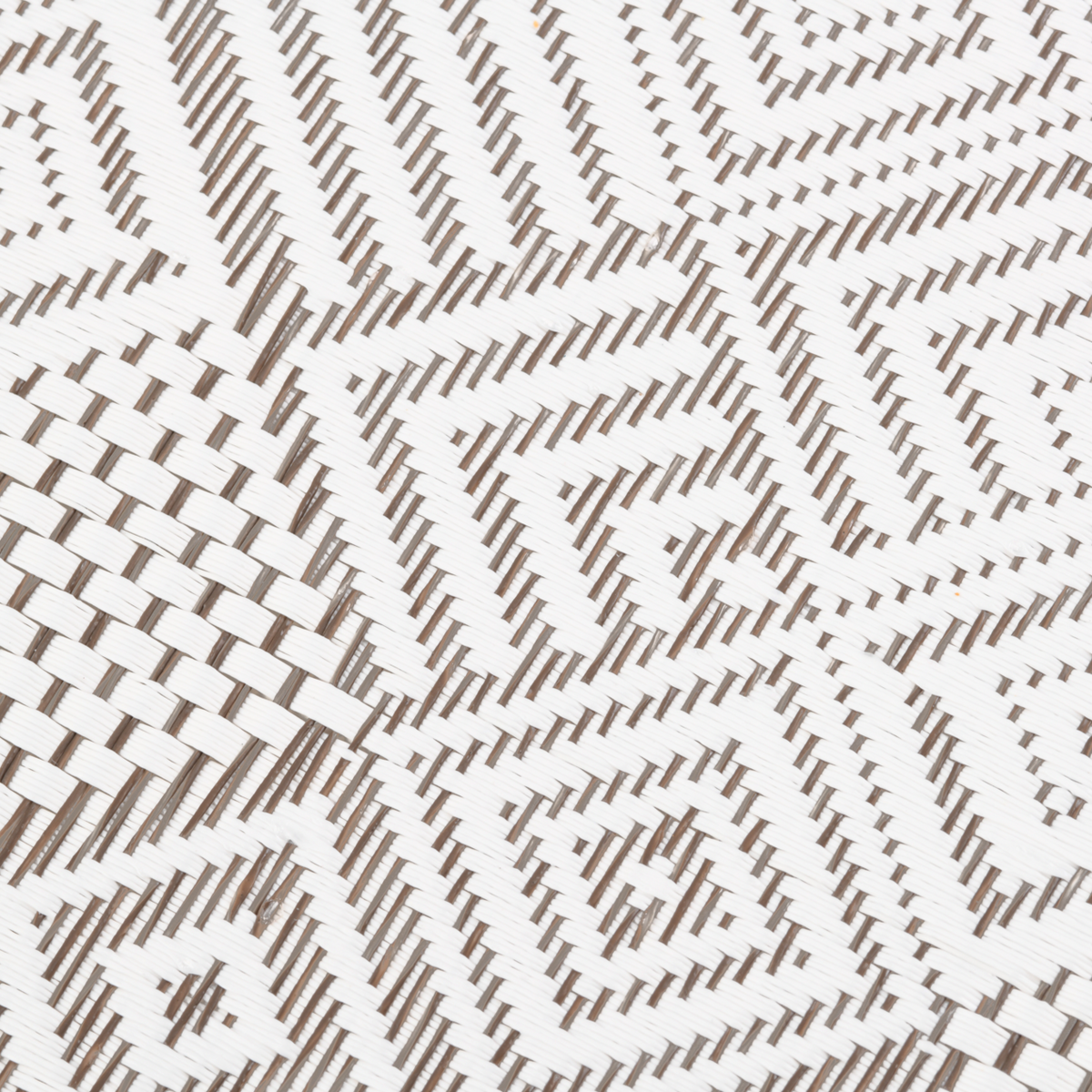 Gewebtes Tischset aus Kunststoff in Weiß und Grau mit grafischem, geometrischem Webmuster.
