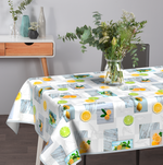 Wachstischdecke Fruits aus abwischbarem Material mit buntem Zitrusfrüchte-Muster und dekorativen Holzoptik-Elementen