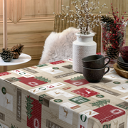 Wachstischdecke XMas aus beschichtetem Material mit weihnachtlichem Patchwork- und Tannenbaummuster, abwischbar