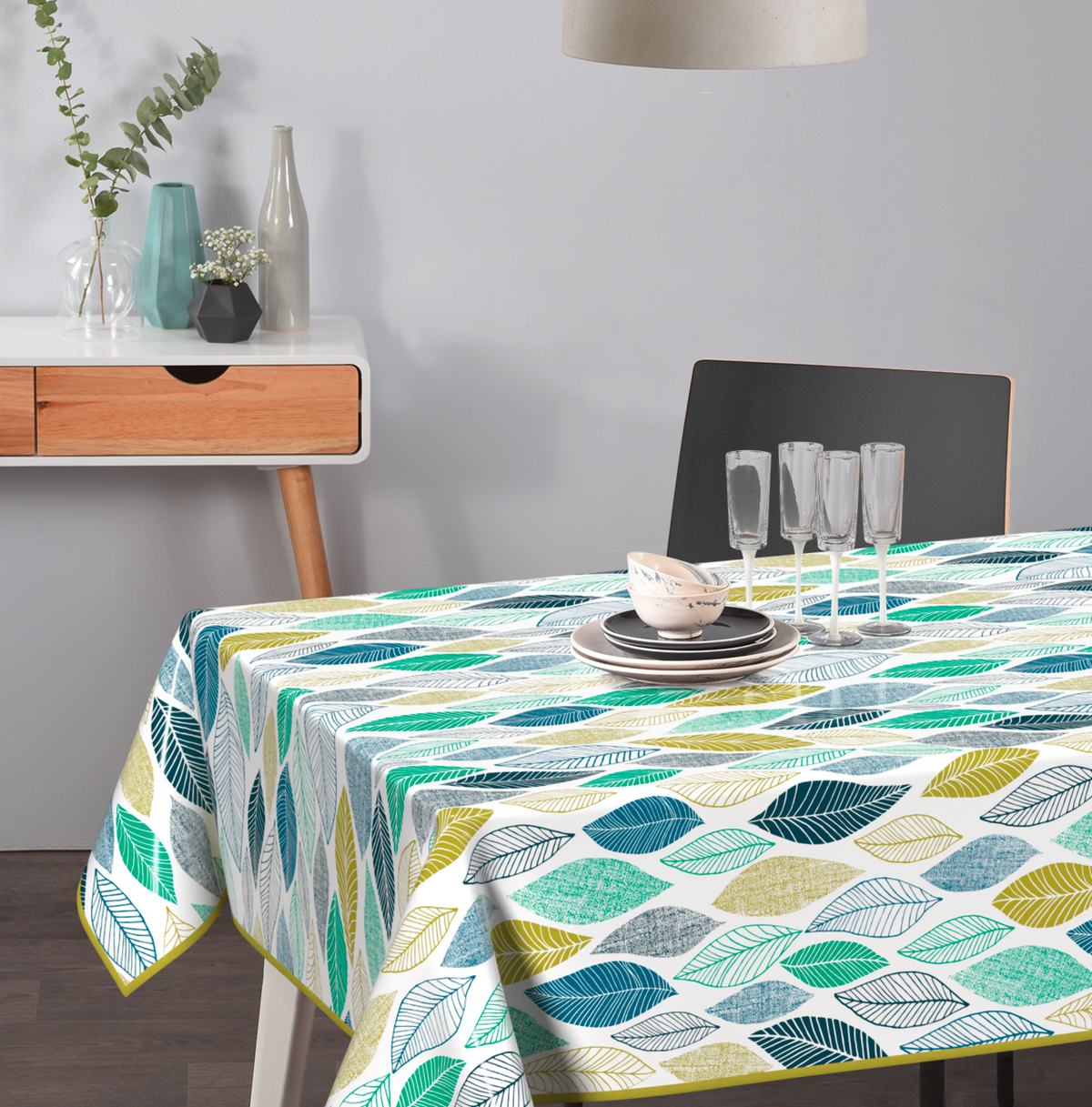 Geprägte Wachstischdecke mit buntem Blättermuster in Türkis, Blau, Grün und Gelb, abwaschbar und glänzend